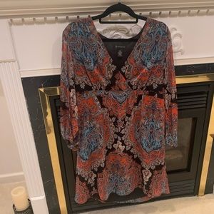 Bohemian dress- stylish and sexy.  Peekaboo sleeves shoulder to cuff.